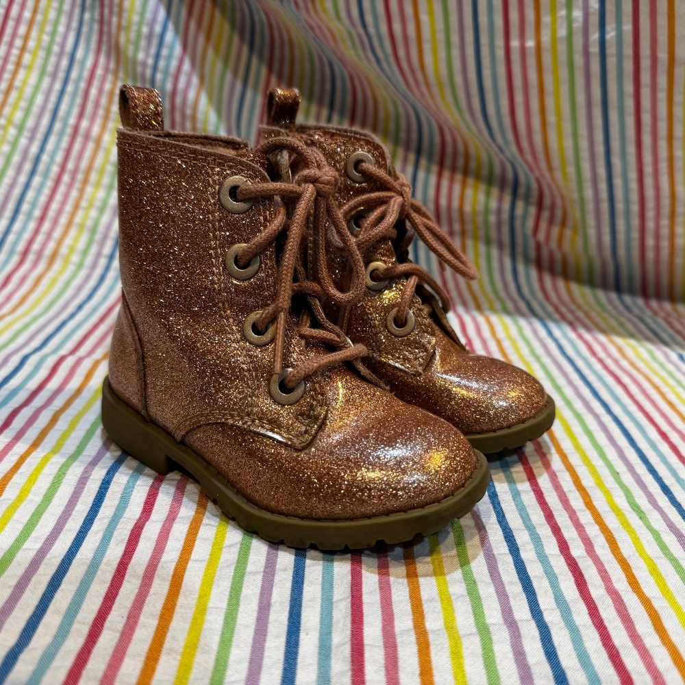 Sparkly pink lace-up boots